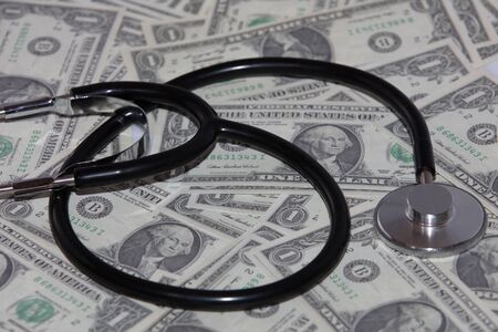 Stethoscope On $1 Bill Backgroundの写真素材