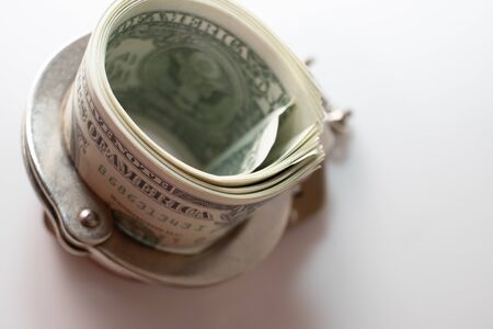 dollars and police handcuffs on a white backgroundの写真素材
