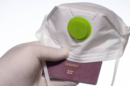 Passport, mask protection to prevent coronavirus. Concept of travel during the spread of a virusの写真素材