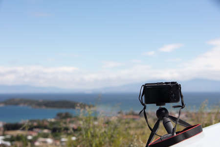 Camera on a tripod for taking a panorama in the open airの写真素材