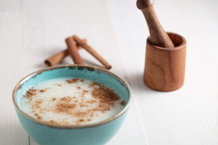 Rice Pudding with Cinnamon in a bowlの写真素材