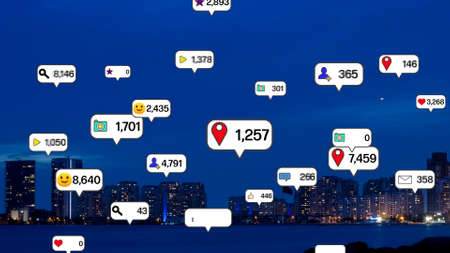 Social media icons fly over city downtown showing people engagement connection through social...