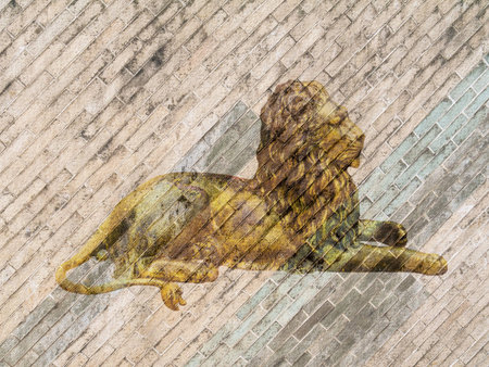 Gold lion image pattern on brick wallの写真素材