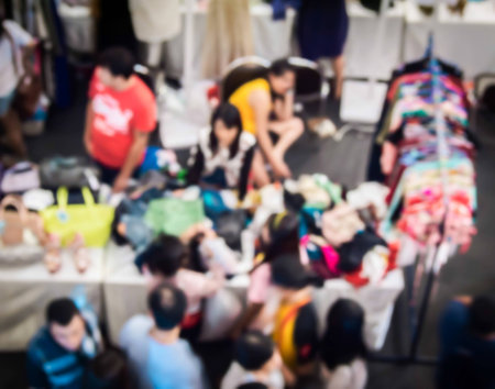abstract blur the people at the  traditional clothes market.