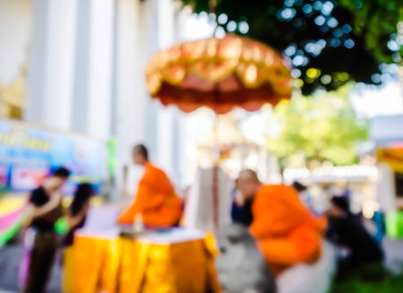 abstract blur the people respect and esteem the monk in buddhist monastery.の写真素材