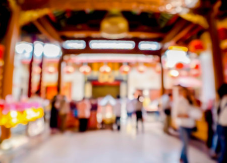 abstract blurred buddhist praying buddha in chinese temple,Thailandの写真素材