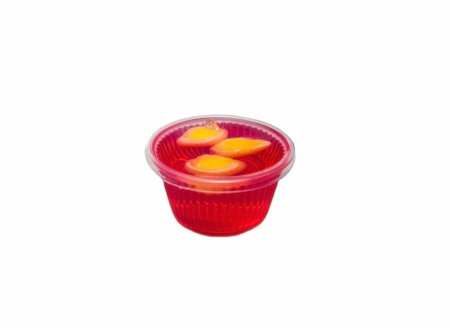 Tasty red jelly cubes with cereal in bowl isolated on white background.の写真素材