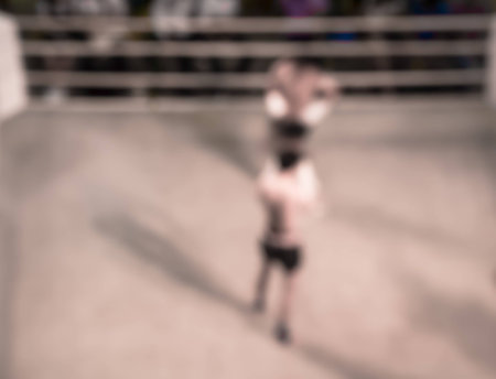 Abstract blur original  muay-thai boxing match vintage photo style.の写真素材