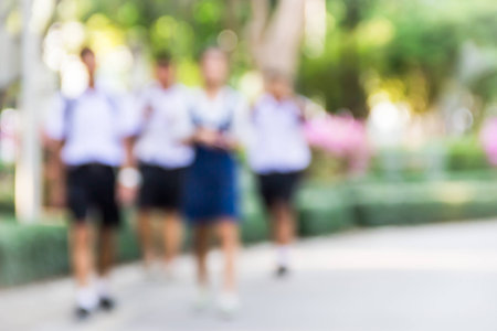 Abstract the student walking in the park near school.の写真素材
