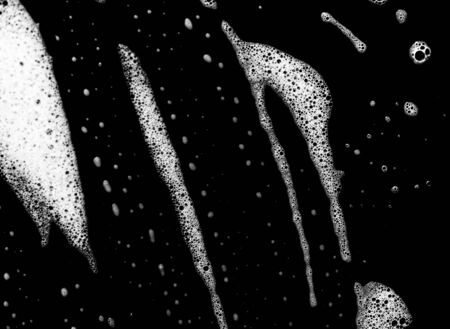 Soap bubbles on a black backgroundの写真素材