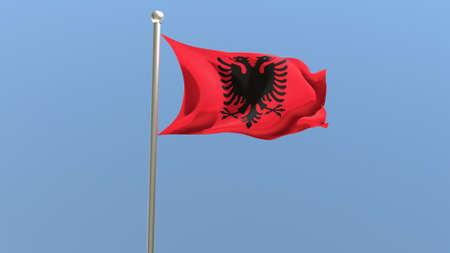 Albanian flag on flagpole. Albania flag fluttering in the wind. 3D render.の写真素材