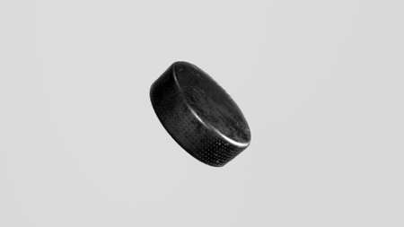 Hockey puck on white background. Realistic hockey attribute . 3d render.