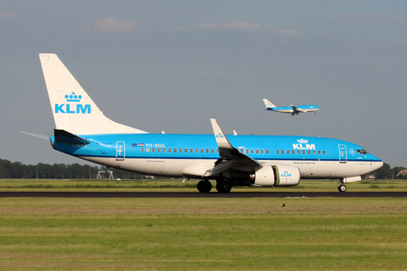 AMSTERDAM - JULY 04: KLM - Royal Dutch Airlines Boeing 737-7K2 lands at AMS Airport in Netherlands on July 04, 2012. KLM is the flag carrier airline of the Netherlands.のeditorial素材