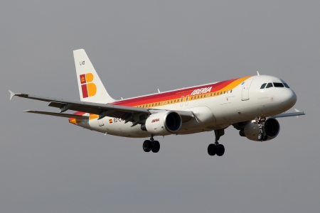 PRAGUE, CZECH REPUBLIC - OCTOBER 10: Iberia Airbus A320-216 lands at PRG Airport on October 10,2013....