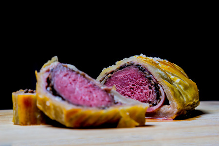 Beef Wellington on black backgroundの写真素材