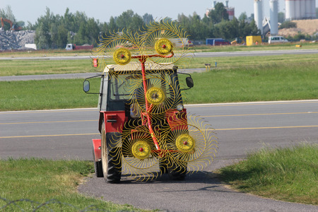 Tractor to mow grassの写真素材