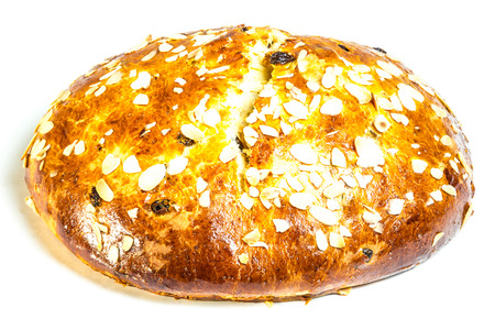 Loaf of sweet bread topped with rolled almondsの写真素材
