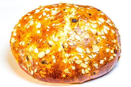 Loaf of sweet bread topped with rolled almondsの写真素材