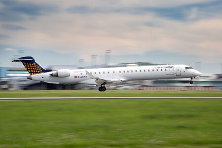 PRAGUE, CZECH REPUBLIC - MAY 13: Eurowings Bombardier CRJ-900 NG lands at PRG Airport on May 13,...