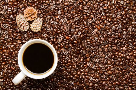 Coffee Beans  Cup of Coffee with Holiday Pine Conesの写真素材
