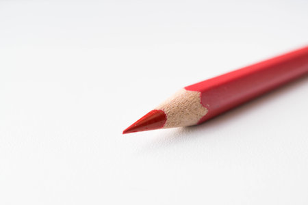 Red color pencil tip isolated on white backgroundの写真素材