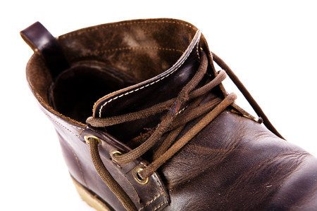 old fashioned brown boots isolated on white