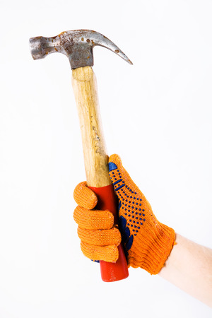 Hammer in hand on whiteの写真素材