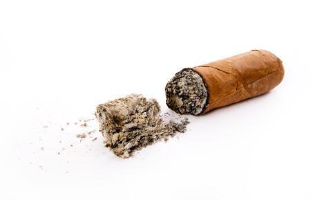 cigar and ashes isolated on whiteの写真素材