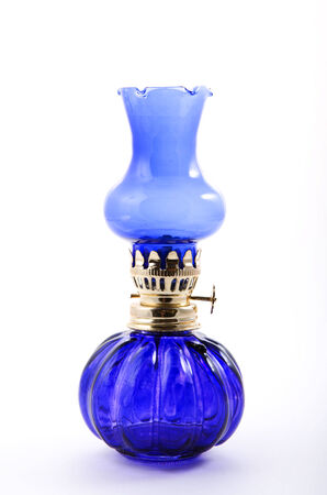 Blue kerosene lamp isolated on whiteの写真素材