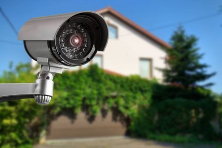 Security camera and private house on the backgroundの写真素材