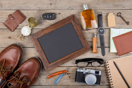 Adventure concept - camera, passport, map, notepad, compass and other stuff for travel