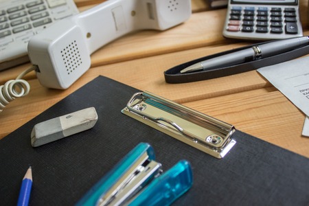 Accounting, stationery on wooden background. Business and Financeの写真素材