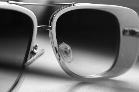White sunglasses on a white background close-up.の写真素材