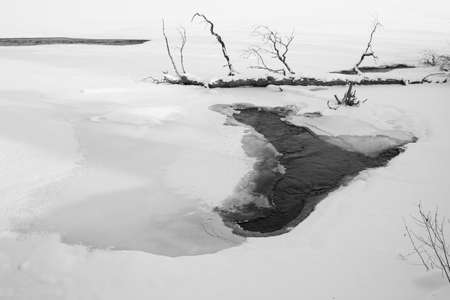 Heart shaped lake in winter. Scenery.