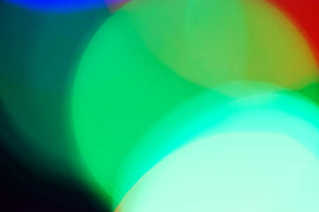 Gigantic Multicolor Bokeh in a blue natural background, defocused