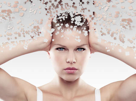 Health and skin care. Close-up portrait of beautiful female touching her head in trouble.