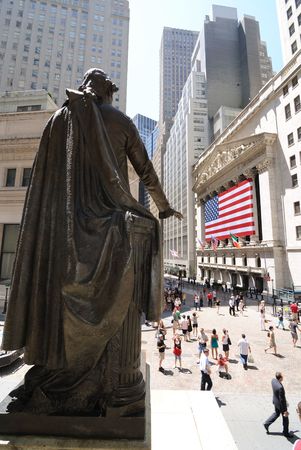New York, New York, July 12, 2010 - Looking from behind the statue of George Washington in Federal hall towards The New York Stock Exchange in Lower Manhattan.のeditorial素材