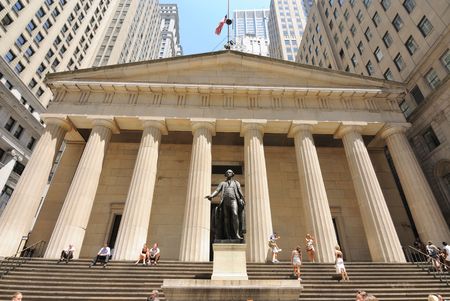 New York, New York, July 12, 2010 - Federal Hall in Downtown Manhattan, site of the first Capitol of the United States, with tourists relaxing on the steps.のeditorial素材