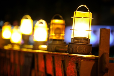 lights on a street barrier in the city at night.の写真素材