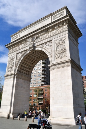 Pedestrians stroll about under the Washington Square Monument in New York City. April 8, 2010.のeditorial素材