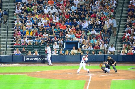 Atlanta, Georgia - June 16, 2011: Atlanta Braves batter swings at a pitch at Turner Field.のeditorial素材