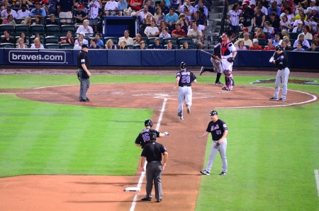 Atlanta, Georgia - June 16, 2011: Angel Pagan of the New York Mets rounds third base after knocking out a 2-run homerun against the Atlanta Braves.のeditorial素材