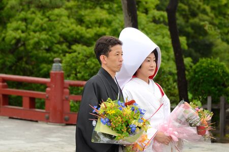 Kamakura, Japan - July 19, 2011: A traditional Japanese wedding ceremony at Tsurugaoka Hachiman-g¨±, the most important temple in Kanagawa Prefecture.のeditorial素材