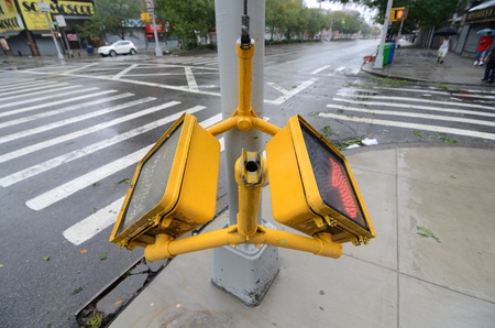 NEW YORK CITY - AUGUST 28: A damaged crosswalk sign in the aftermath of Hurricane Irene on Augut 28, 2011 in New York, NY.のeditorial素材