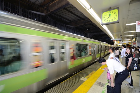 TOKYO, JAPAN - JULY 6: Averaging 2.4 million passengers on an average weekday, Shibuya Station is Japan's 4th largest station on July 6, 2011 in Tokyo, Japan.のeditorial素材