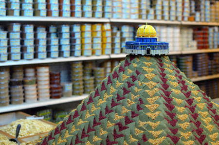 Spice mound with small model of the Dome of the Rock in the Souq of Jerusalem, Israel.のeditorial素材