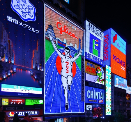 OSAKA - NOVEMBER 25: The famed advertisements of Dotonbori on November 25, 2012 in Osaka, Japan. With a history reaching back to 1612, the districtis now one of Osaka's primary tourist destinations.のeditorial素材