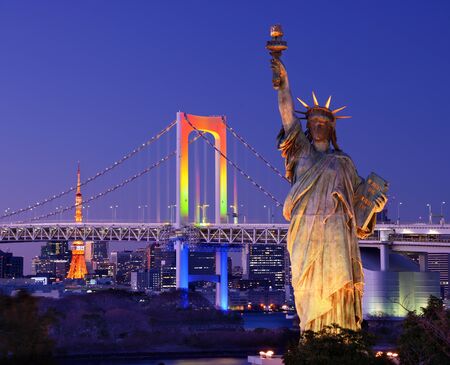 Statue of Liberty, Rainbow Bridge, and Tokyo Tower as seen from Odaiba in Tokyo, Japan.のeditorial素材