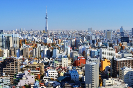 The Tokyo Sky Tree towers above the dense skyline of Tokyo, Japan のeditorial素材