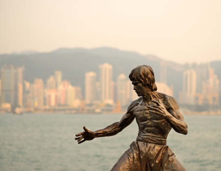 HONG KONG - OCTOBER 8: Bruce Lee statue at Avenue of the Stars October 8, 2012 in Hong Kong, China. Modelled on the Hollywood Walk of Fame, it honors stars of the Hong Kong film industry.のeditorial素材